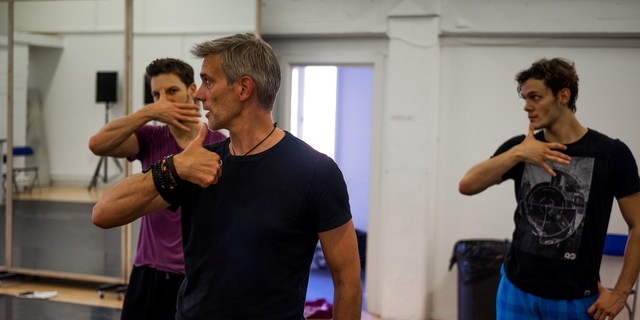 Adam Cooper (Original Swan / Stranger) mentoring the Swans in rehearsals